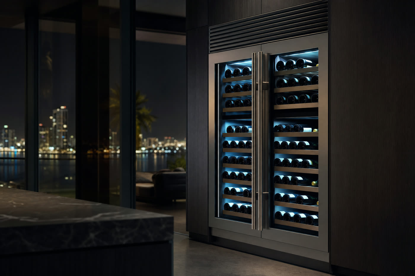 A dual-zone wine storage column with bottles on wooden shelves
